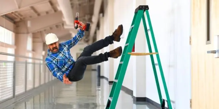 Man falling off a ladder